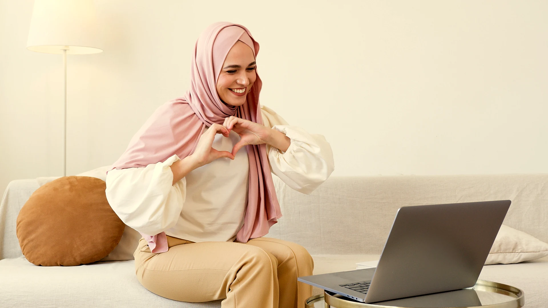 A woman on a video call, warm and present—The Directory community connection